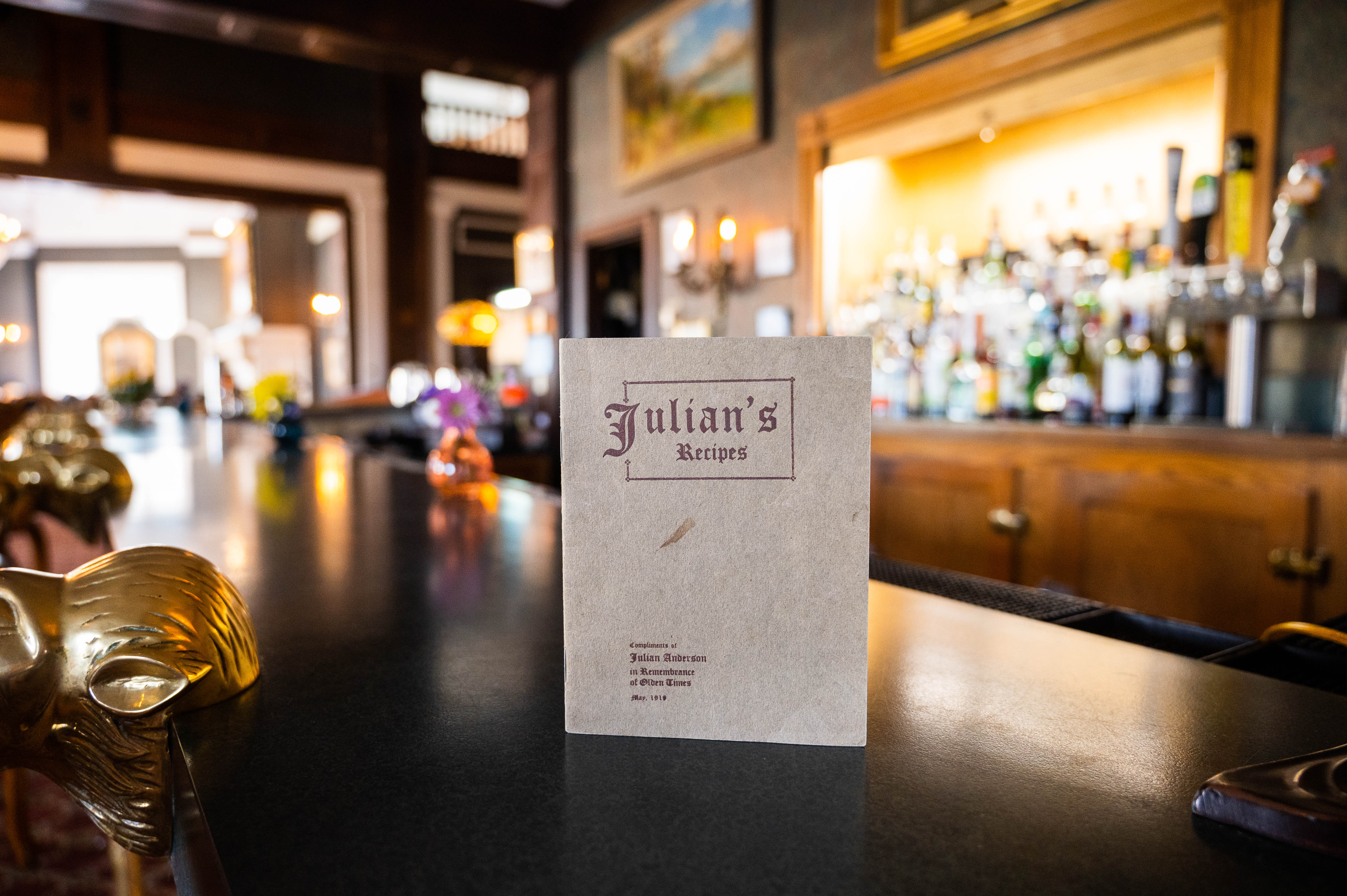 Image of "Julian's Recipes" book on the Montana Club Bar